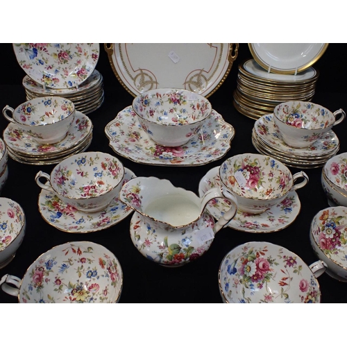 161 - A FLORAL PART TEA SERVICE a quantity of Aynsley 'Elizabeth' teaplates, a Limoges cake plate, and two... 