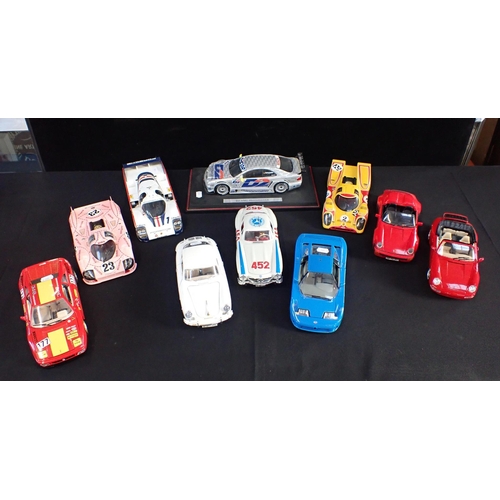 173 - A COLLECTION OF BURAGO AND OTHER 1/18 MODEL CARS racing cars and others, Mercedes, Bugatti, Porsche,... 