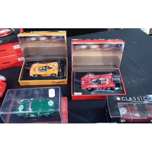 175 - A COLLECTION OF MINIBRI OFFICIAL FORMULA ONE FERRARI MODELS mostly boxed, and other Ferrari models i... 