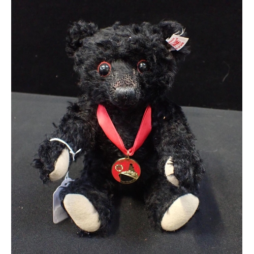 178 - A STEIFF REPLICA 'TITANIC' BEAR a vintage black cat, and other toys