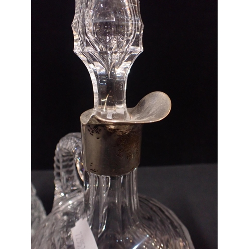 258 - AN EDINBURGH CRYSTAL STYLE THISTLE DECANTER with a silver sherry label, and a silver-mounted claret ... 