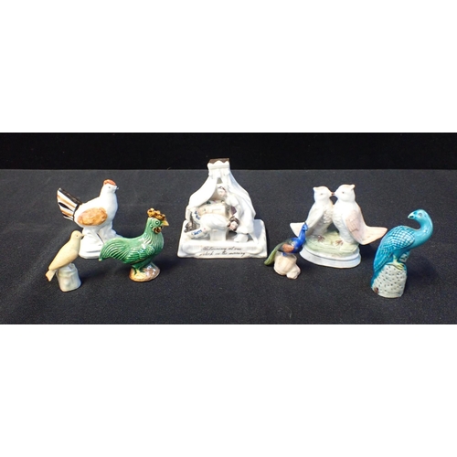 280 - A SMALL VICTORIAN CHICKEN FIGURE 8cm high, other bird figures, and a fairing; 'Returning at one o'cl... 