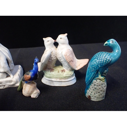 280 - A SMALL VICTORIAN CHICKEN FIGURE 8cm high, other bird figures, and a fairing; 'Returning at one o'cl... 