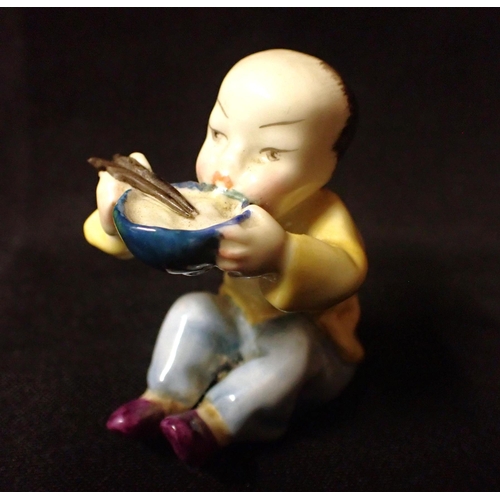 281 - F.E.DOUGHTY FOR ROYAL WORCESTER; 'CHINA' a figure from People of Nations series, a boy with chopstic... 