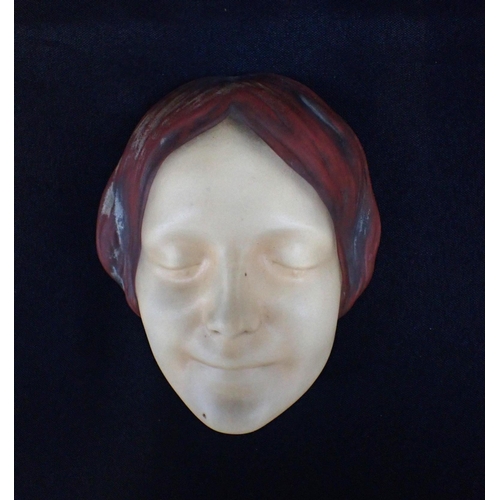 287 - A CERAMIC WALL MASK; 'L'NCONNUE DE LA SEINE' with indistinct incised marks 15cm high