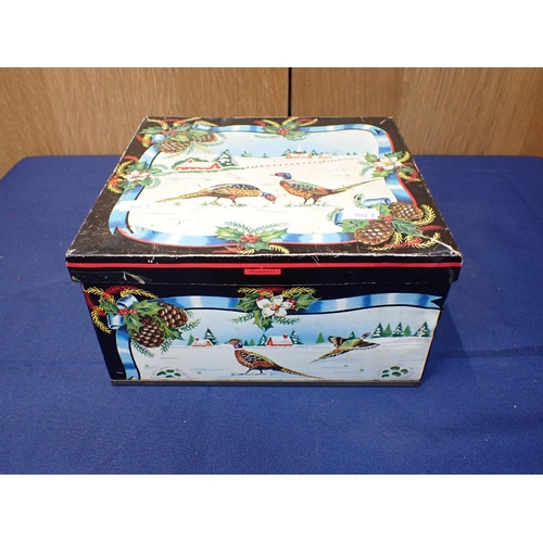 91 - A HUNTLEY & PALMER CHRISTMAS BISCUIT TIN decorated with a wintry scene