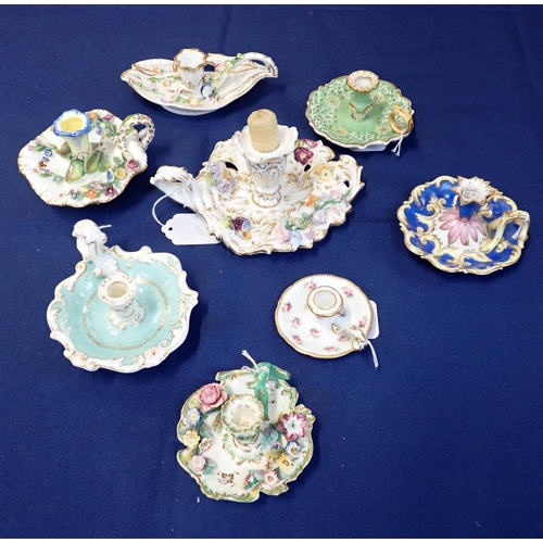 305 - A COLLECTION OF EIGHT EARLY 19TH CENTURY ENGLISH PORCELAIN CHAMBER STICKS mostly floral encrusted, v... 