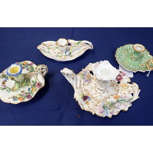 305 - A COLLECTION OF EIGHT EARLY 19TH CENTURY ENGLISH PORCELAIN CHAMBER STICKS mostly floral encrusted, v... 