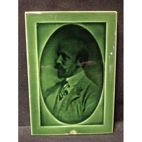 309 - A POOLE/CARTERS PLAQUE DEPICTING CHARLES VAN RAALT 15.5 x 11cm (chip)