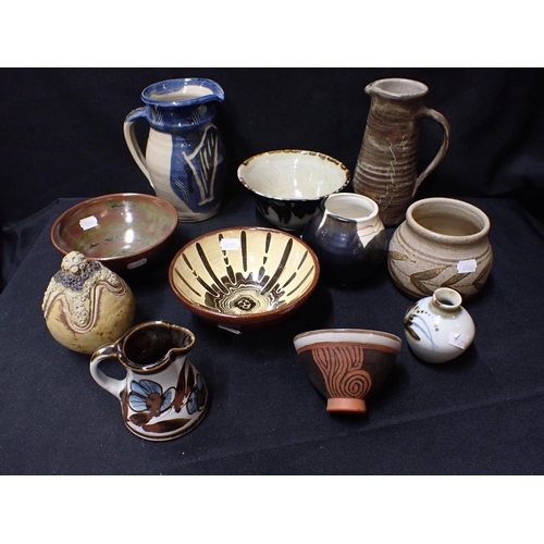 310 - A COLLECTION OF STUDIO POTTERY including examples by David Eeles, Stephanie Kalan and others