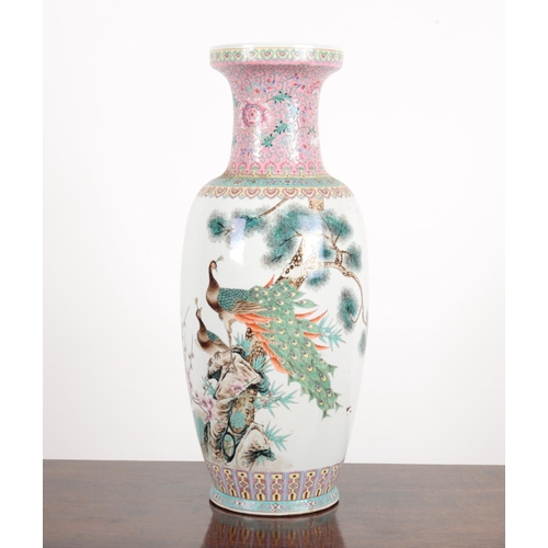 313 - A CHINESE PORCELAIN FAMILLE ROSE BALUSTER VASE signed and inscribed to the body, decorated with peac... 