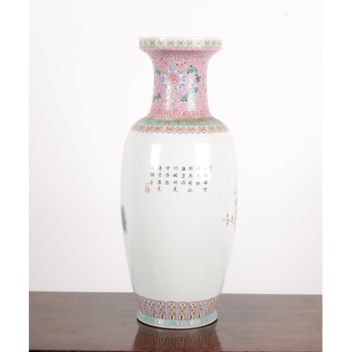 313 - A CHINESE PORCELAIN FAMILLE ROSE BALUSTER VASE signed and inscribed to the body, decorated with peac... 