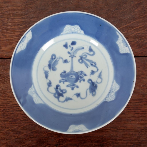 329 - TWO SIMILAR CHINESE BLUE AND WHITE PLATES Qing dynasty, the larger with flower mark to the base, the... 