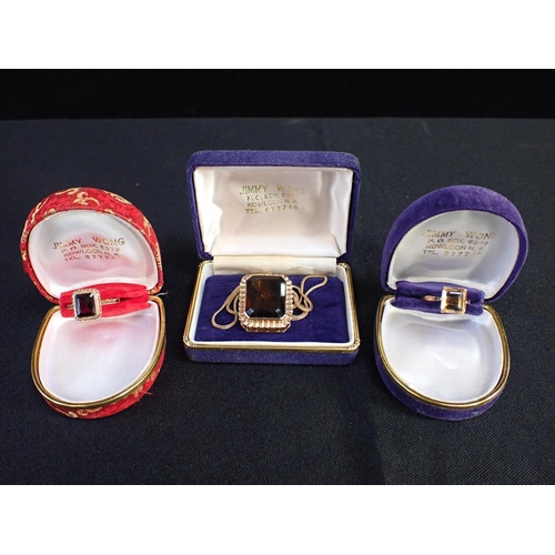 409 - TWO DRESS RINGS, BOTH STAMPED 14K, RETAILED JIMMY WONG Kowloon, and a similar pendant/brooch (in nam... 