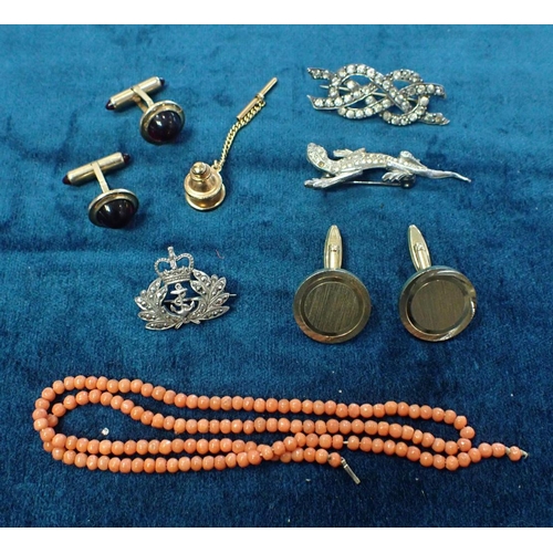 421 - A CORAL BEAD NECKLACE together with three silver brooches, and two pairs of cufflinks and a stud