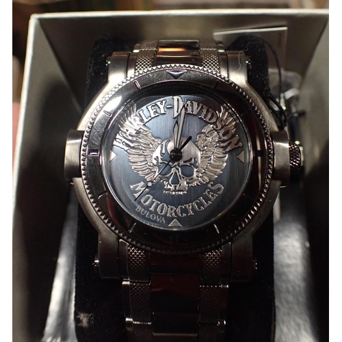 426 - HARLEY DAVIDSON: A GENTLEMANS' BRACELET WATCH by Bulover, in the original watch box; and a quantity ... 