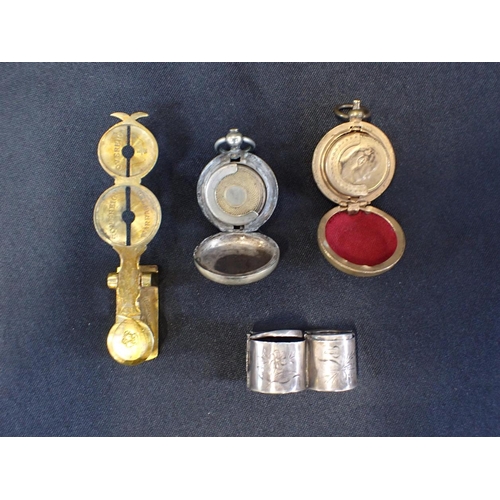 455 - A WHITE METAL COIN HOLDER, STAMPED 84 'with engraved decoration, with two sovereign fob holders and ... 