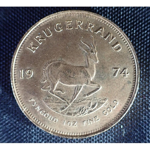 486 - A 1974 SOUTH AFRICAN GOLD KRUGGERAND reverse with springbok, c. 33.9 grams