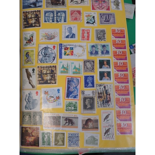 491 - A QUANTITY OF BRITISH AND INTERNATIONAL STAMPS mostly 20th Century, some in albums, a large proporti... 