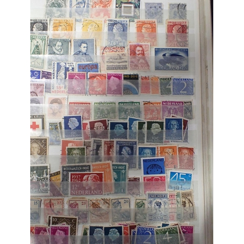 493 - A COLLECTION OF WORLD STAMPS, SOME MINT in albums, and some empty albums (8)