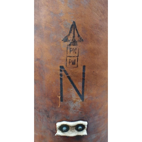 513 - A LEATHER COVERED NAVAL SHELL CARRIER marked with'N' and broad arrow, WWI type 82cm high (general we... 