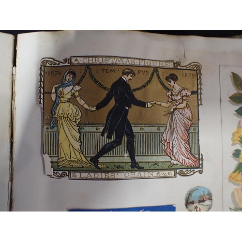 537 - TWO VICTORIAN SCRAP ALBUMS containing a variety of greetings cards with typically eccentric themes, ... 