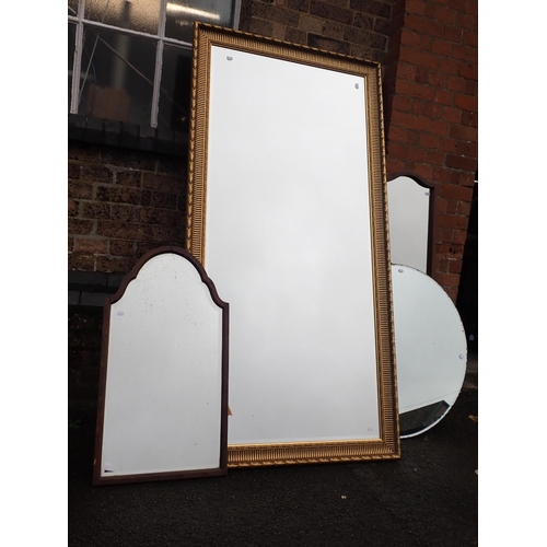 828 - A LARGE GILT FRAMED WALL MIRROR with bevelled plate (modern) 183 x 92cm and three other mirrors (4)