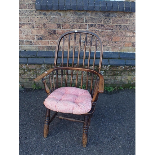 837 - A 19TH CENTURY STAINED ASH AND ELM WINDSOR ARMCHAIR with two tier stick back, wood seat, on turned l... 