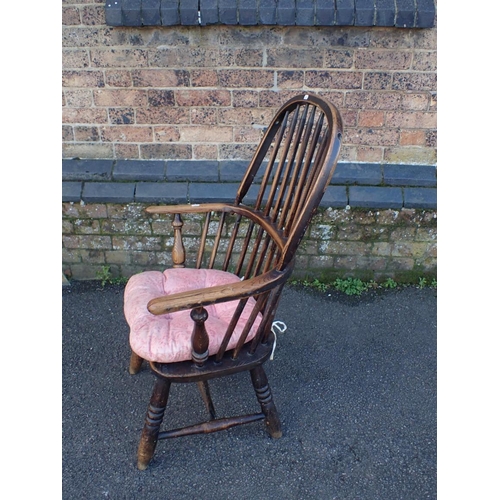 837 - A 19TH CENTURY STAINED ASH AND ELM WINDSOR ARMCHAIR with two tier stick back, wood seat, on turned l... 