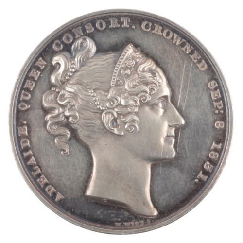 112 - A WILLIAM IV SILVER CORONATION MEDAL

1831, the obverse with a bust of the King and the reverse with... 