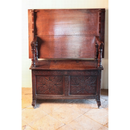 122 - A CHARLES II OAK BENCH TABLE

circa 1660 and later, with shaped arms on baluster supports over a rec... 