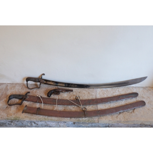 137 - A PAIR OF 1796 PATTERN LIGHT CAVALRY OFFICER'S SABRES

one blued and gilt with foliage, a stand of a... 