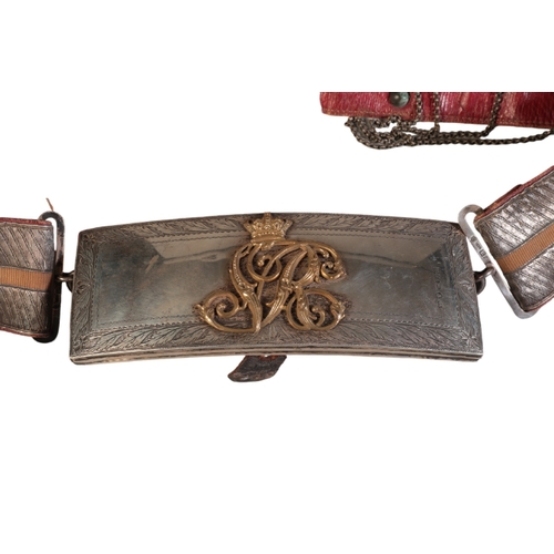 140 - AN OFFICER'S SILVER AND ORMOLU-MOUNTED FLAP POUCH AND BELT

the silver face with engraved borders of... 