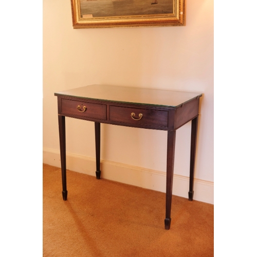 172 - A GEORGE III MAHOGANY BOWFRONT DRESSING TABLE

with two drawers on tapered bock legs terminating in ... 