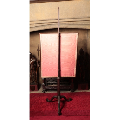 190 - A GEORGE II WALNUT POLE SCREEN

with a rectangular needlework banner worked with a spray of ribbon-t... 