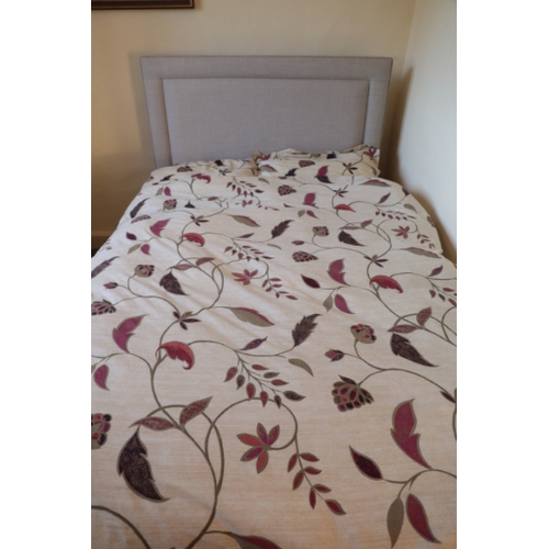 197 - A MODERN DOUBLE BED

with a padded rectangular headboard and a Hypnos mattress, 137cm wide x 205cm l... 