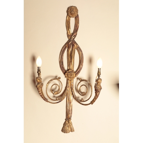 198 - A PAIR OF GEORGE III STYLE GILTWOOD AND GESSO WALL LIGHTS

in the form of ribbons cascading from a l... 