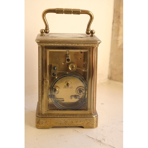 205 - A FRENCH BRASS CASED CARRIAGE CLOCK BY RICHARD OF PARIS

19th century, the enamel dial with Roman nu... 