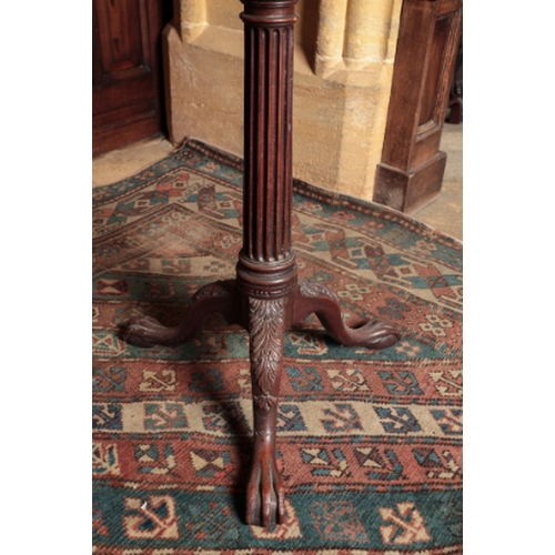 21 - A LATE GEORGE II MAHOGANY TRIPOD TABLE

ensuite with the previous tables, but with a later top, on a... 