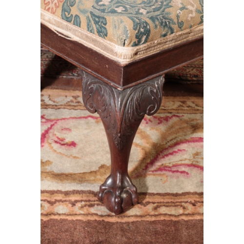 25 - A GEORGE II STYLE MAHOGANY STOOL

the rectangular seat upholstered in 18th century petit point flora... 