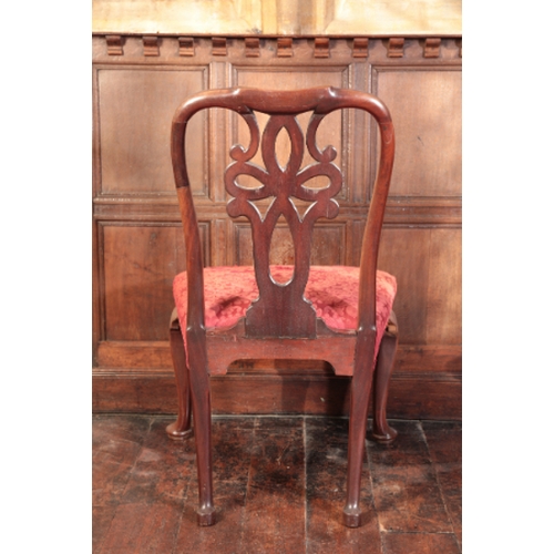 276 - A SET OF SIX GEORGE II MAHOGANY DINING CHAIRS

with pierced and interlaced vase-shaped splats over u... 