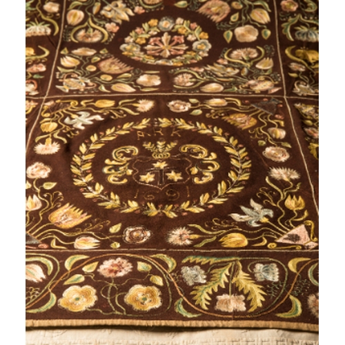 309 - A WILLIAM AND MARY NEEDLEWORK BEDSPREAD

decorated with flowers and leafy tendrils, on a brown wool ... 