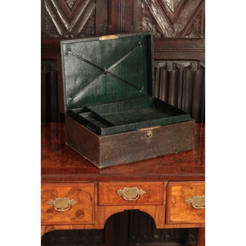 340 - A VICTORIAN GREEN MOROCCO STATIONERY BOX

with a recessed brass handle to the lid and a fitted inter... 