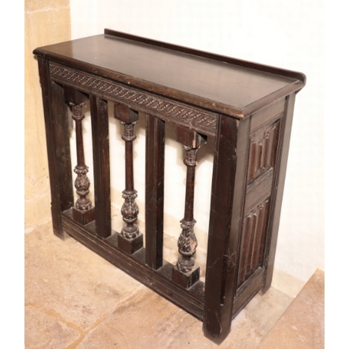 342 - AN OAK LOG BIN

constructed from 17th century panelling, with a stop-fluted frieze and conforming mu... 