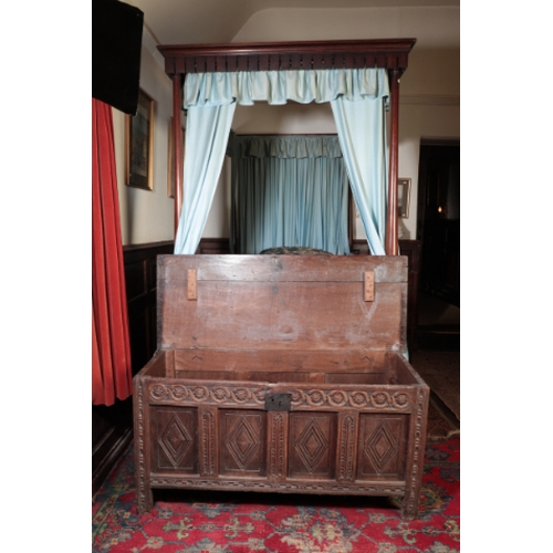 347 - A CHARLES II OAK JOINED COFFER

with a guilloche-carved frieze above four panels carved with lozenge... 