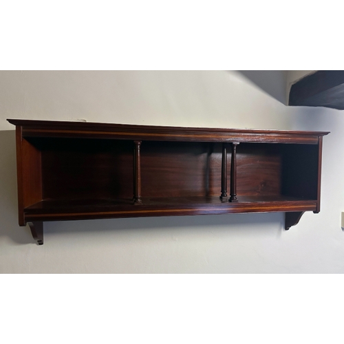 352 - A PAIR OF EDWARDIAN INLAID MAHOGANY WALL SHELVES

with turned uprights to the central sections, 125c... 