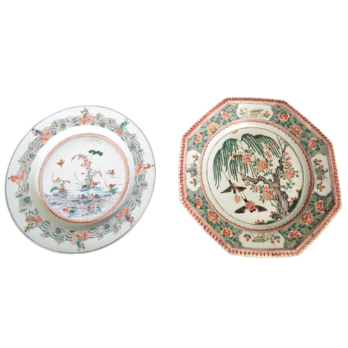 366 - A PAIR OF CHINESE FAMILLE VERTE CHARGERS

Qianlong, each enamelled in polychrome with birds swimming... 