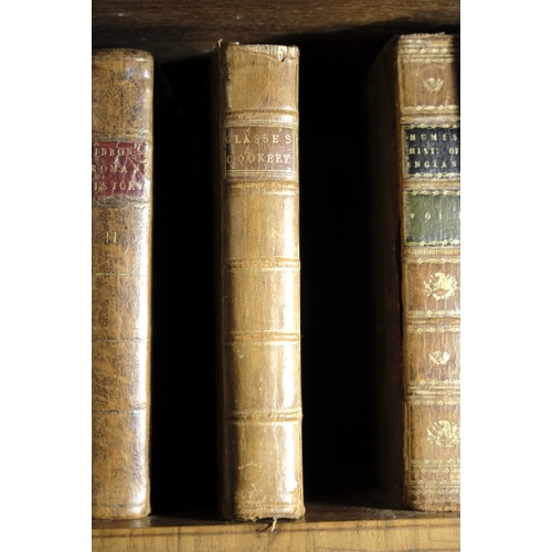 448 - A COLLECTION OF 18TH CENTURY AND LATER LEATHER-BOUND BOOKS

including Glasse's Cookery; a Charles II... 