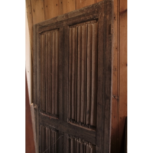 465 - AN OAK DOOR FRAME

with Gothic arch and strap hinges (approx. 204 cm high x 94cm wide); an ornate pi... 