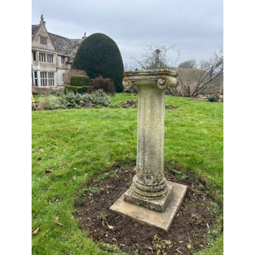 478 - A COMPOSITE STONE PLINTH

the square top over an ionic capital, fluted columns to stepped base, 100c... 